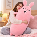 Pink rabbit plush pillow lifestyle