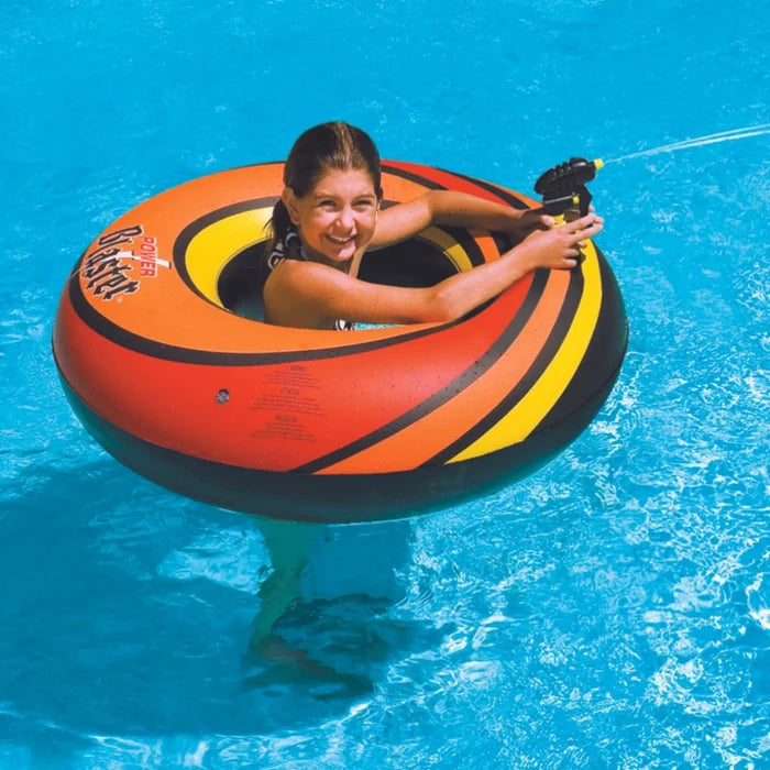 Child playing in a swimming pool with an orange and black Swimline 40-inch Inflatable Power Blaster Super Squirter swim ring and water gun